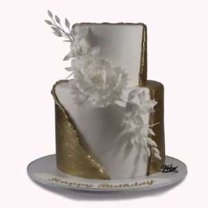 White flower with gold Veil.