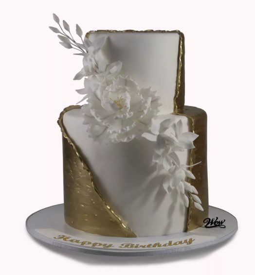 White flower with gold Veil.